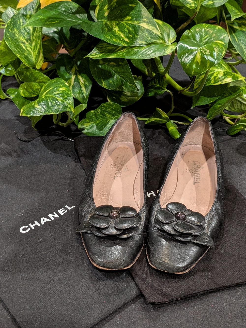 CHANEL Black Leather Camellia Ballet Flats with Bow Detail